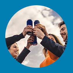 Image of group of people toasting with beverage