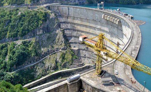 Aerial image of contstruction crane over a dam