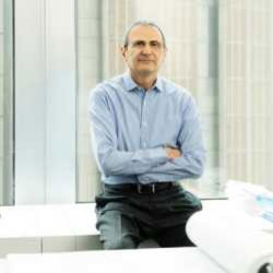 Ahmad Rahimian at desk