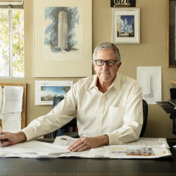 Patrick Hassett sitting on a desk