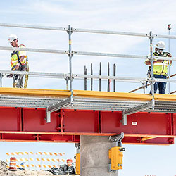 Construction workers working on ramp