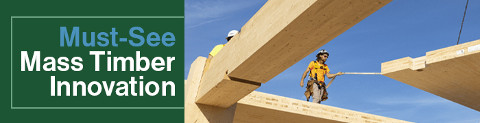 Two construction workers guiding mass timber in a project with headline Must-See Mass Timber Innovation