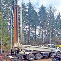 Image of drilling rig in forest